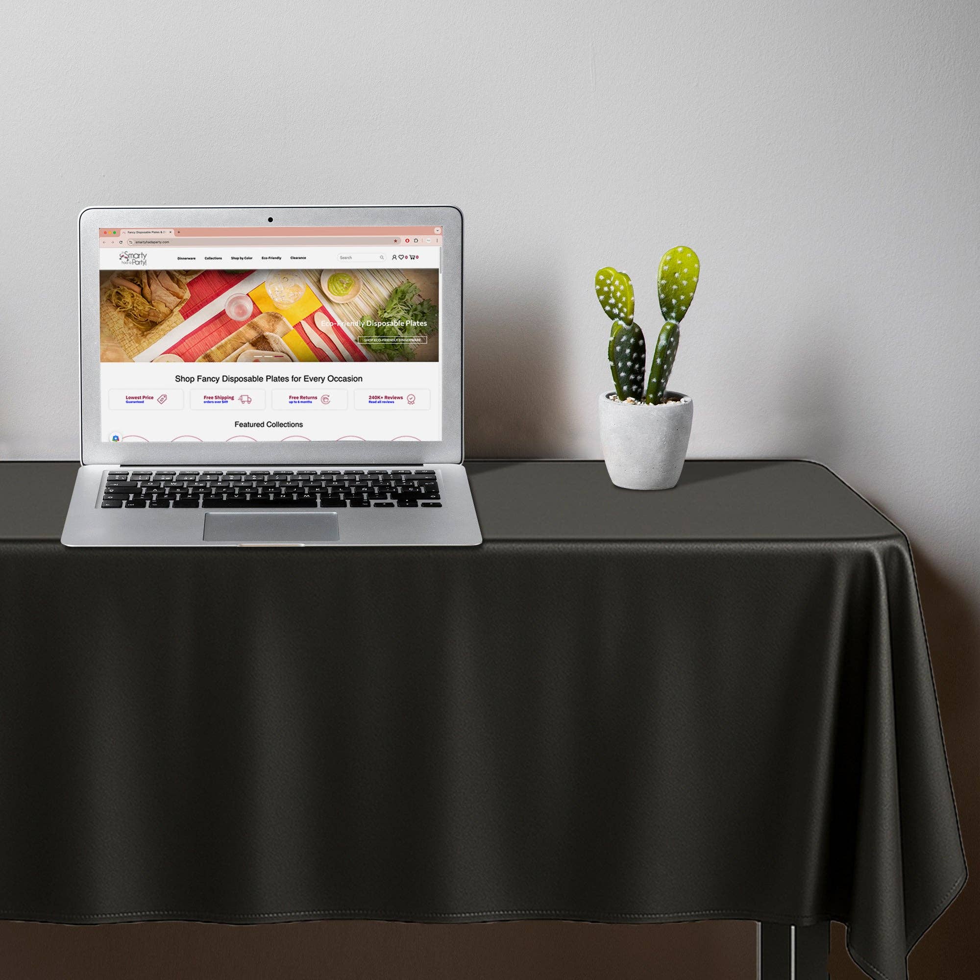 54" x 108" Black Rectangular Plastic Tablecloth - 1 pc